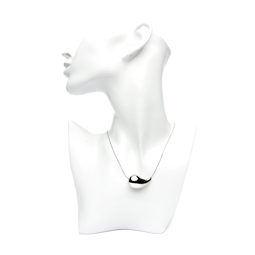 "Silver Waterdrop Necklace on white mannequin" 